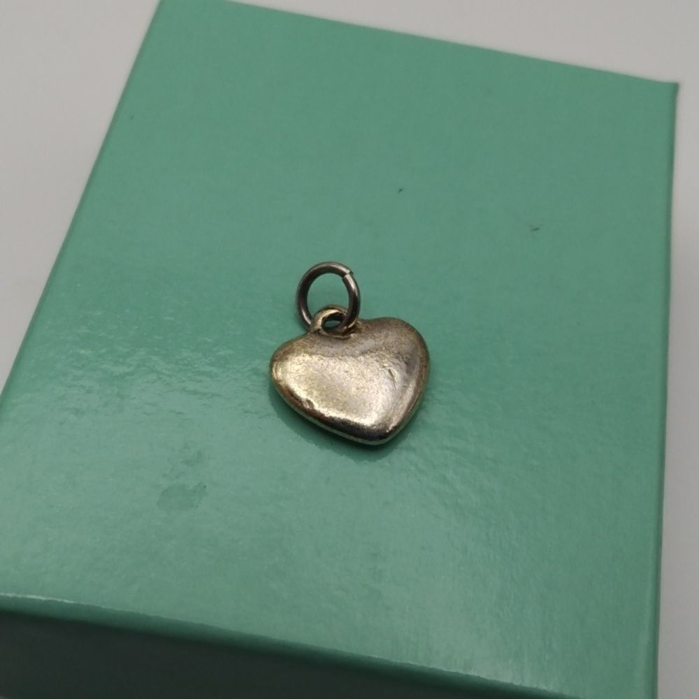 Silver heart charm